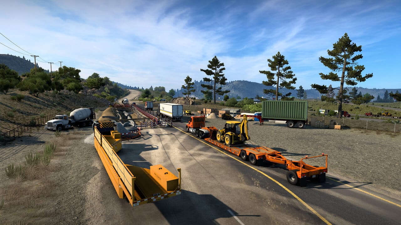Nesta imagem, quatro caminhões carregados trafegam por uma estrada parcialmente aberta, com duas carretas estacionadas à direita e à esquerda. Há também uma betoneira próxima ao canteiro de obras.